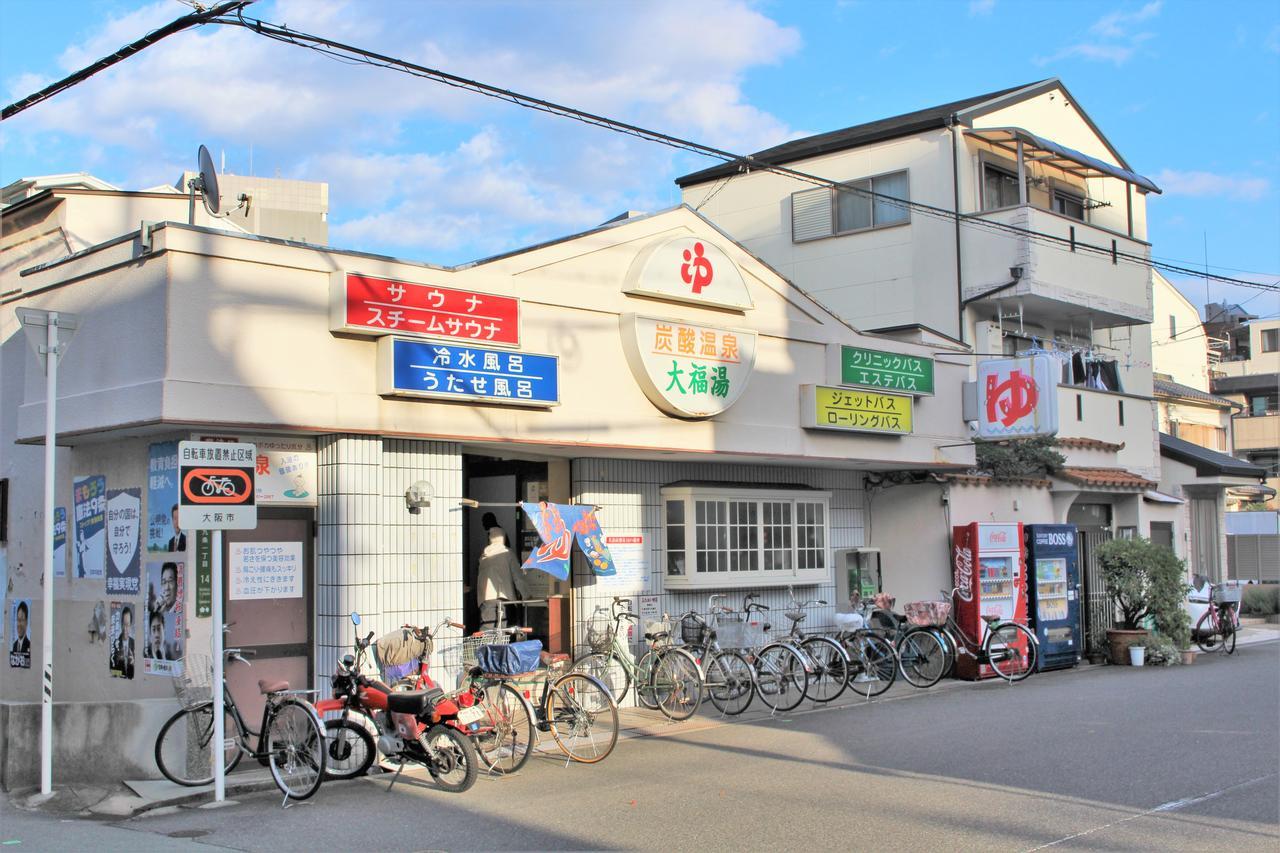 Sekai Hotel Mangetsu Ōsaka Extérieur photo